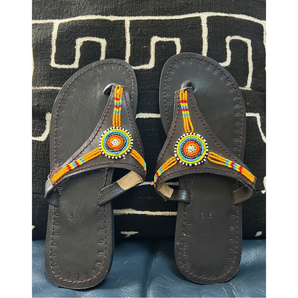 NWOT. Leather beaded sandals from Tanzania.